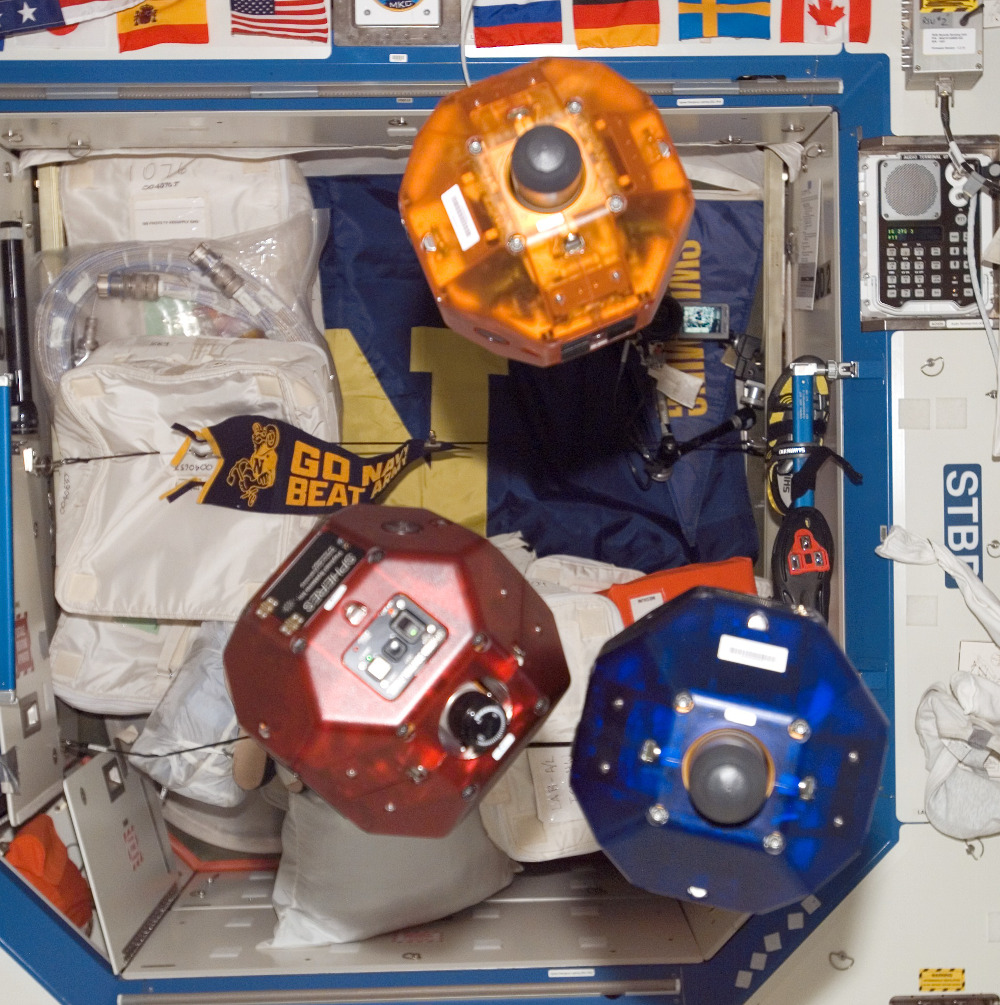 The MIT Spheres on board of the ISS are a potential test-bed for satellite swarm algorithms.