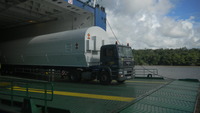 Soyuz rockets unloading from transport ship