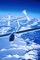 Solar Impulse aircraft over mountains