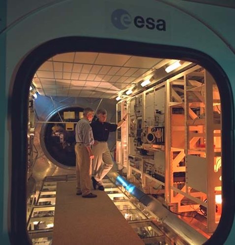 ESA astronaut Ulf Merbold checks out the Biolab glovebox