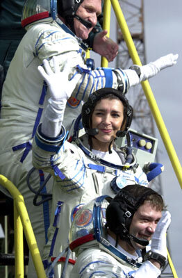 Andromède mission crew walk up the steps to the Soyuz