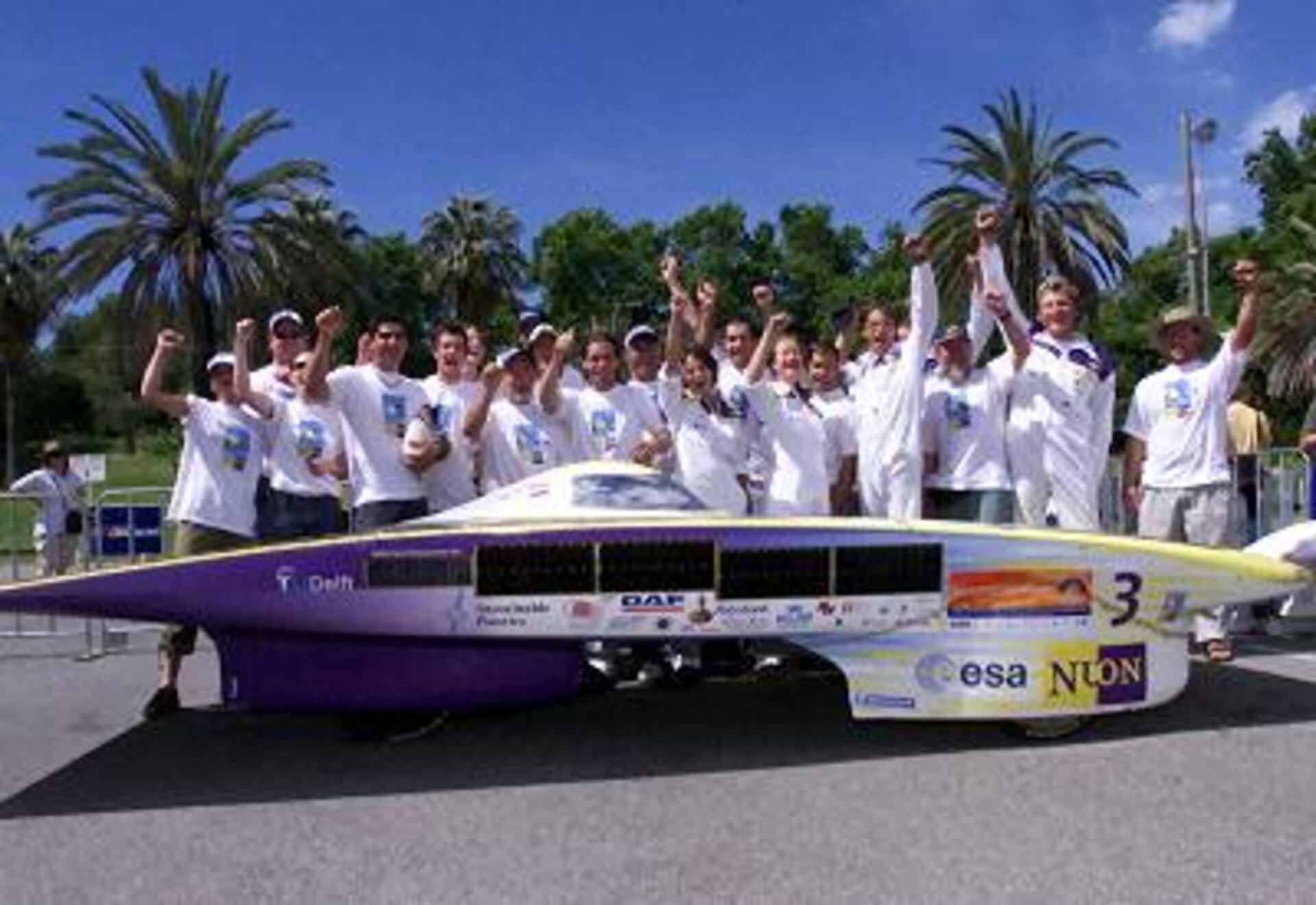 The entire Nuna team and its victorious vehicle
