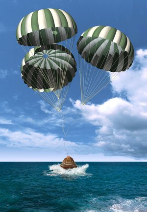 Artist view of the ARD splashdown with parachutes.