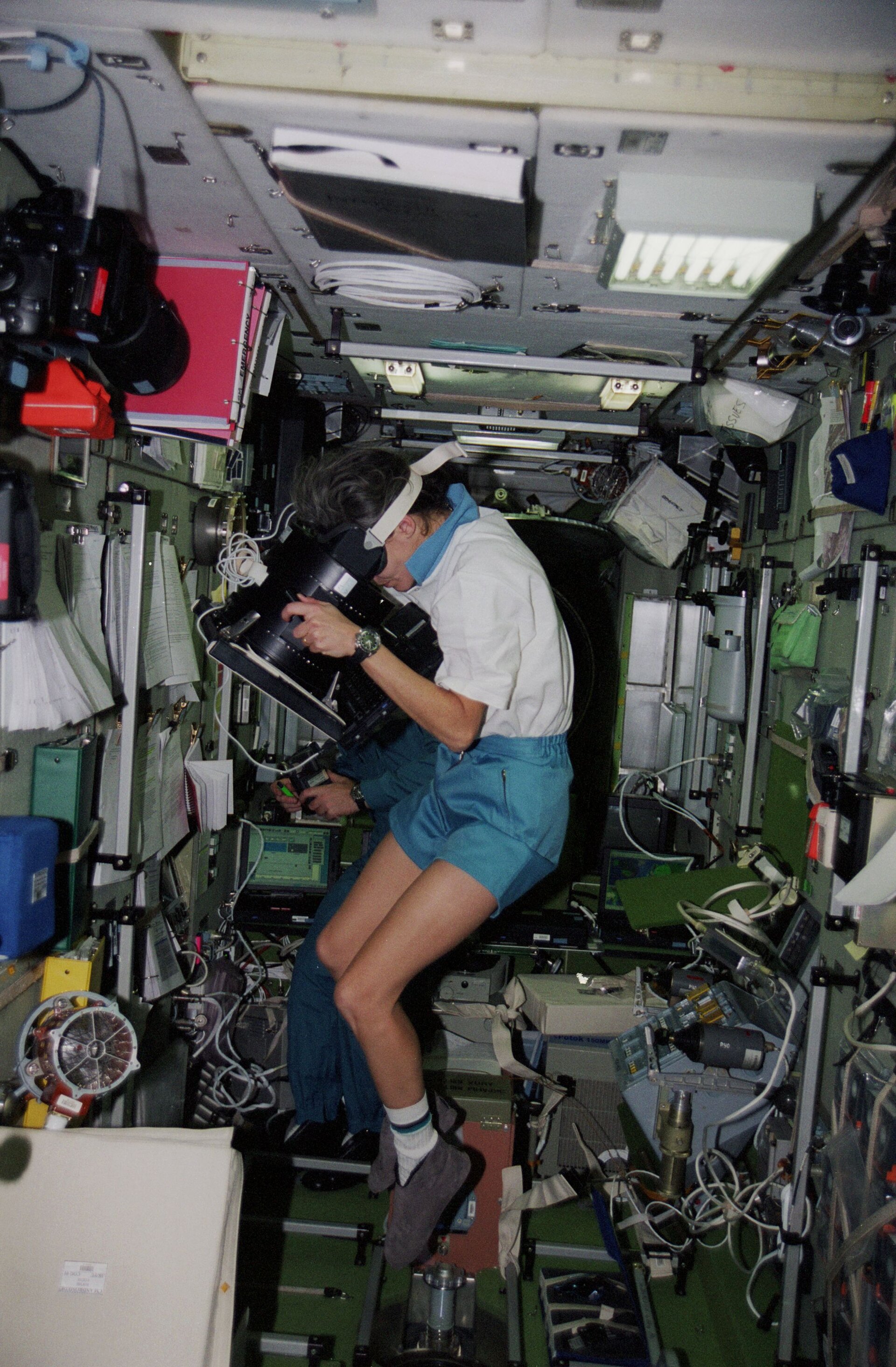 Claudie Haigneré working in the ISS