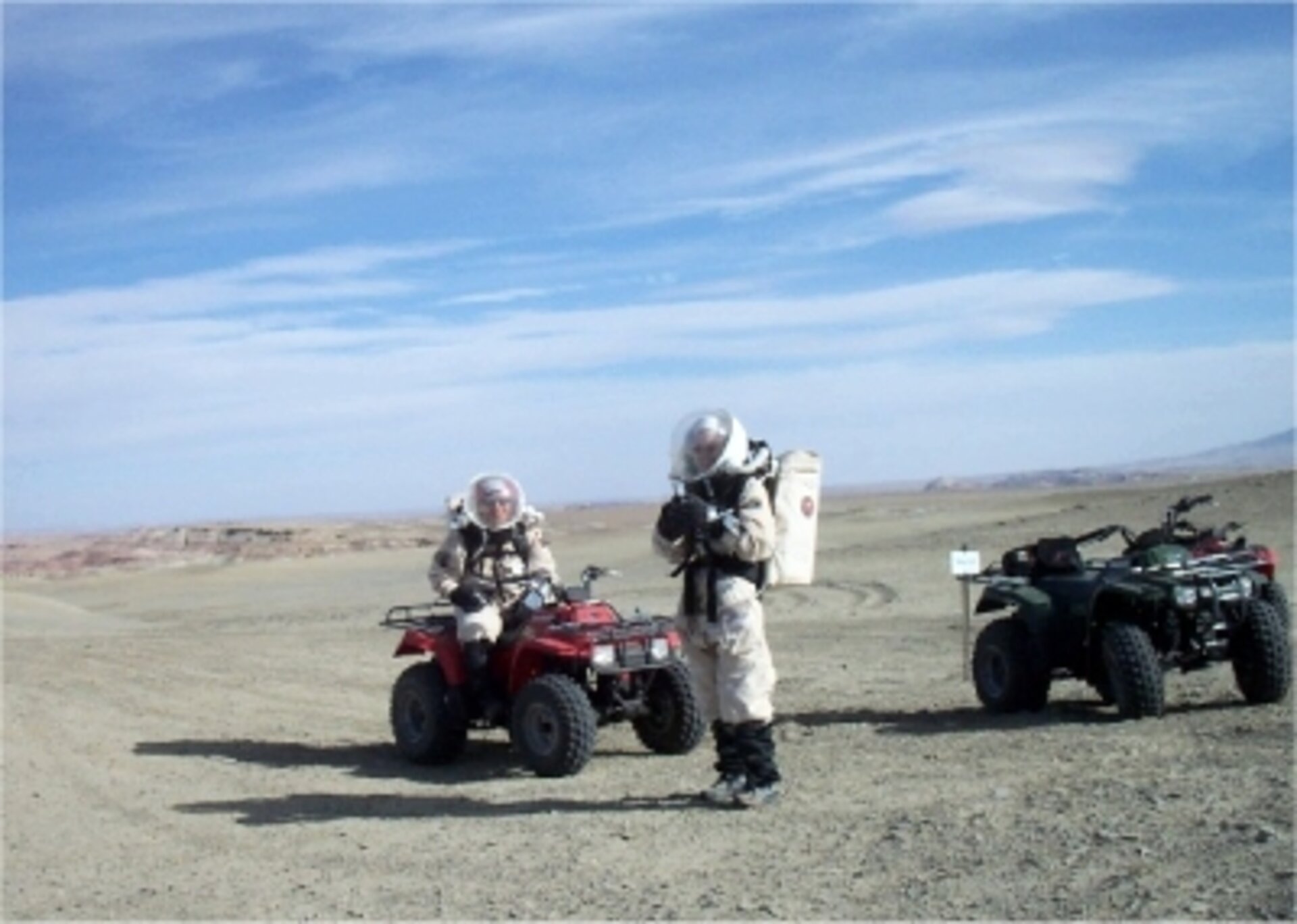 Andrea Fori takes a bearing at the geodetic point mark