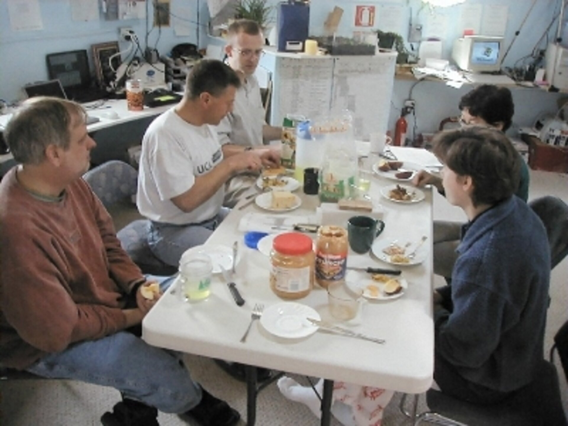 The entire team shares a lunch meal before going on EVA
