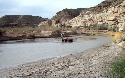 Vladimir Pletser's ATV stuck in the mud in the middle of the river