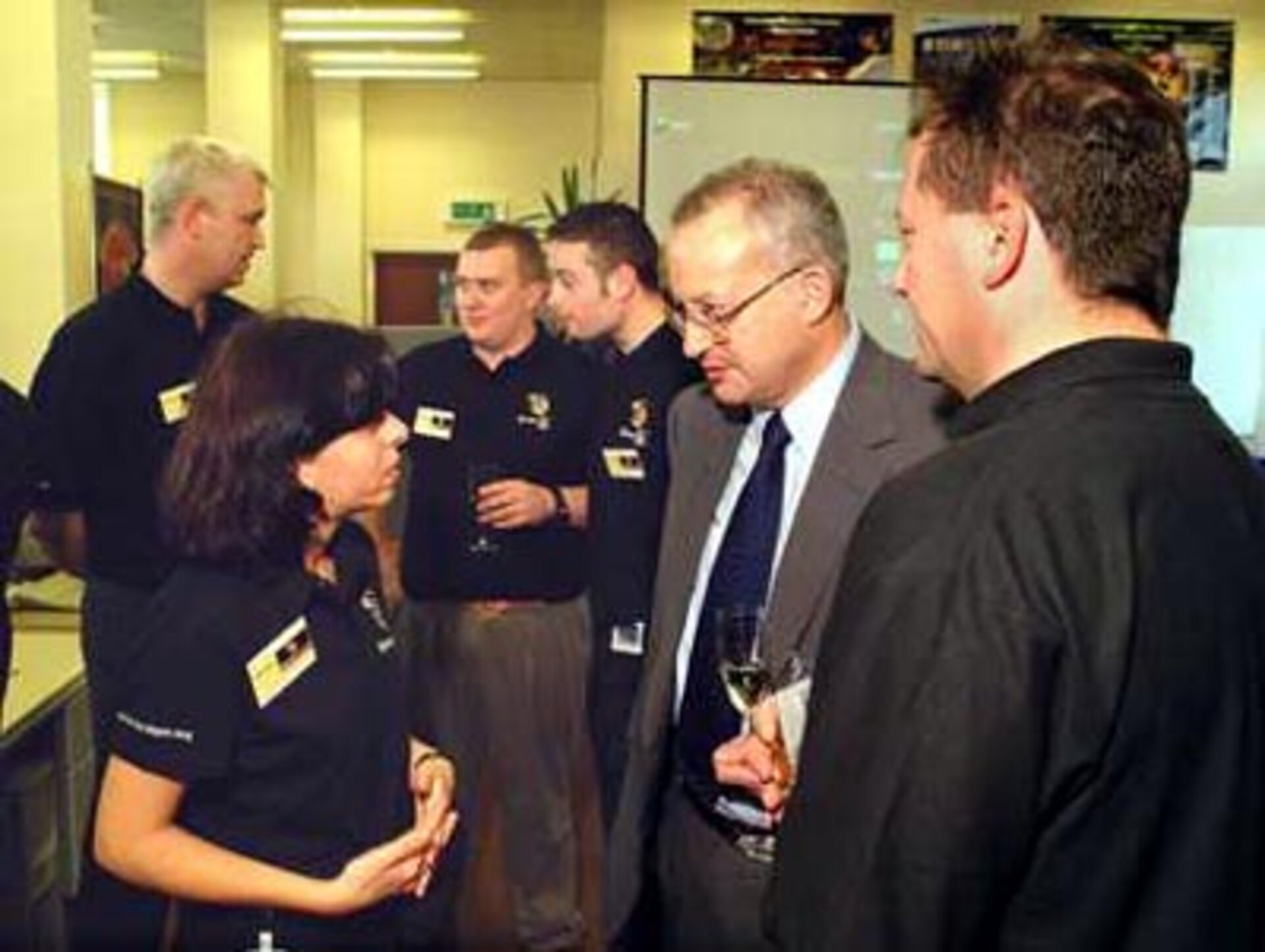 Star Tiger team member speaking with Lord Sainsbury