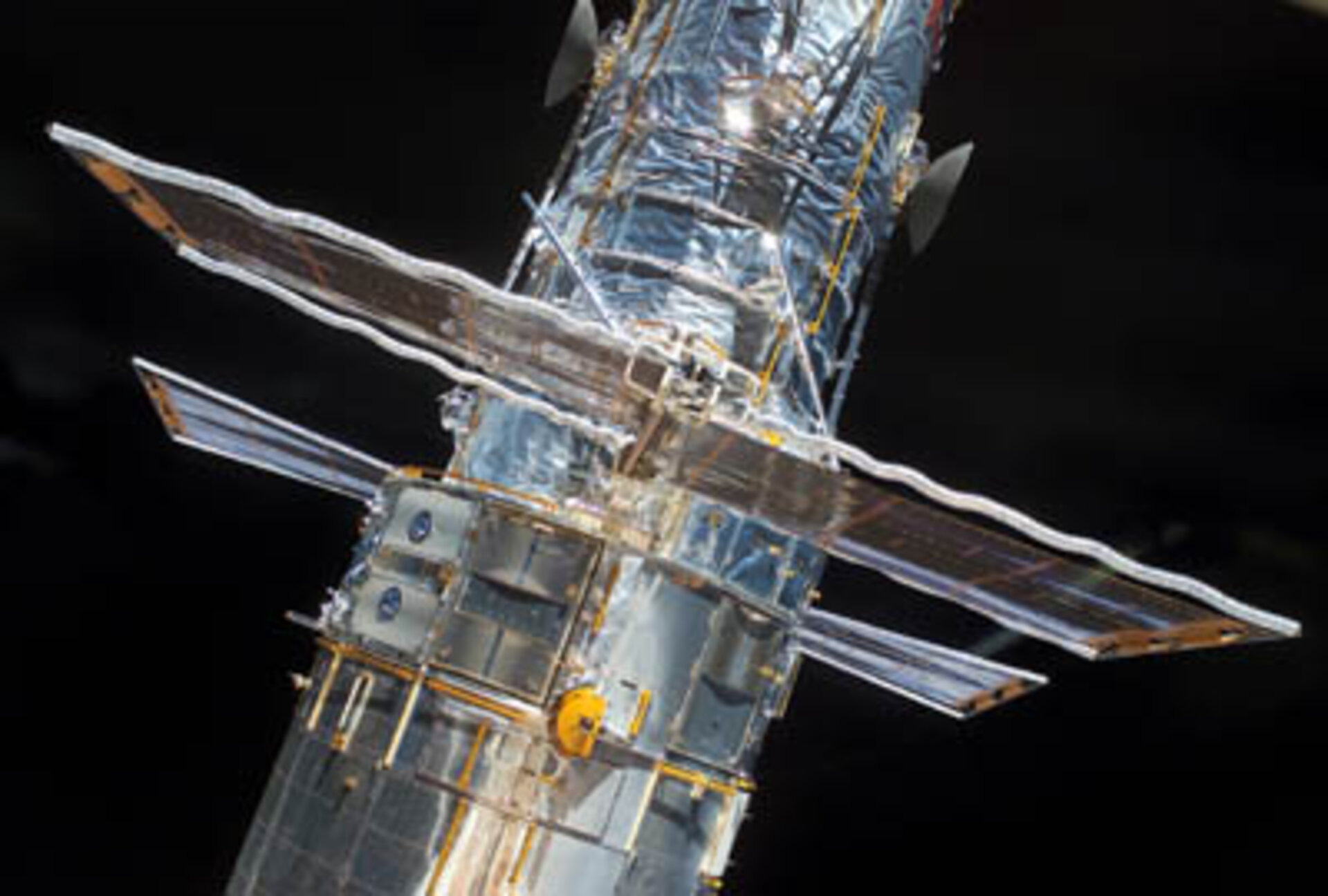 The European-built solar arrays being rolled up for transport back to Earth