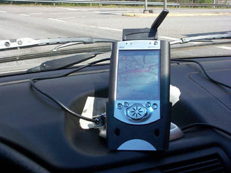 FGI SISNeT hand-held receiver installed in car before testing