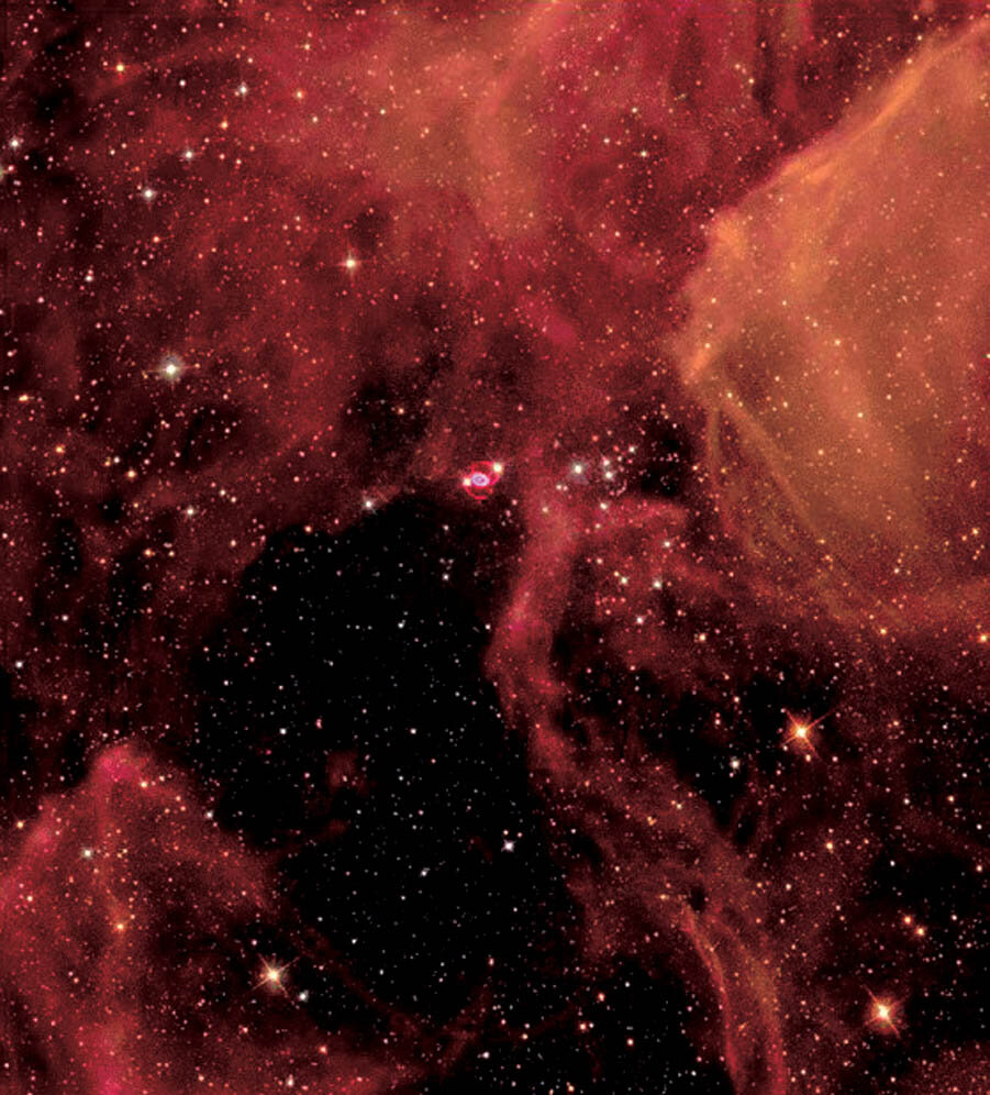 The hourglass shape at the centre of this image is the aftermath of a supernova explosion from 1987