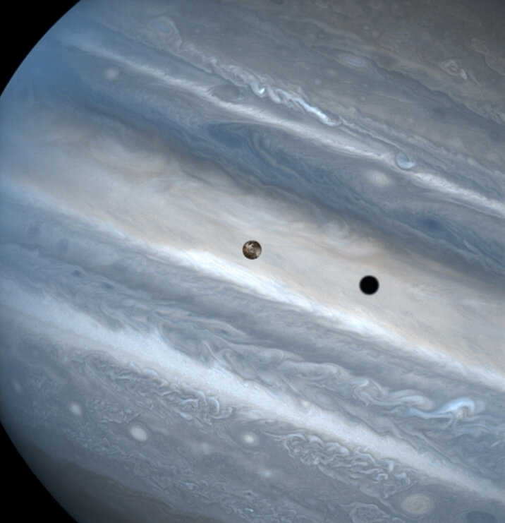 Io casts a shadow as it transits Jupiter