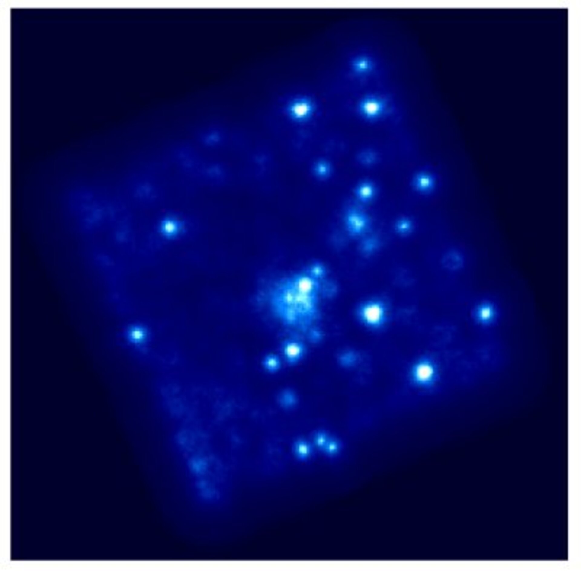 Het wolkje in het midden van deze afbeelding is een van de clusters van melkwegstelsels die door XMM-Newton werd bekeken