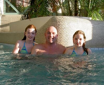 André with his daughters at the tropical swimming pool