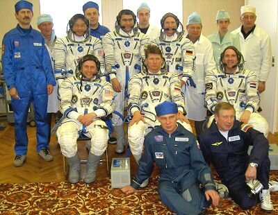 TMA-4 crew and reserve crew with suit technicians in Baikonur