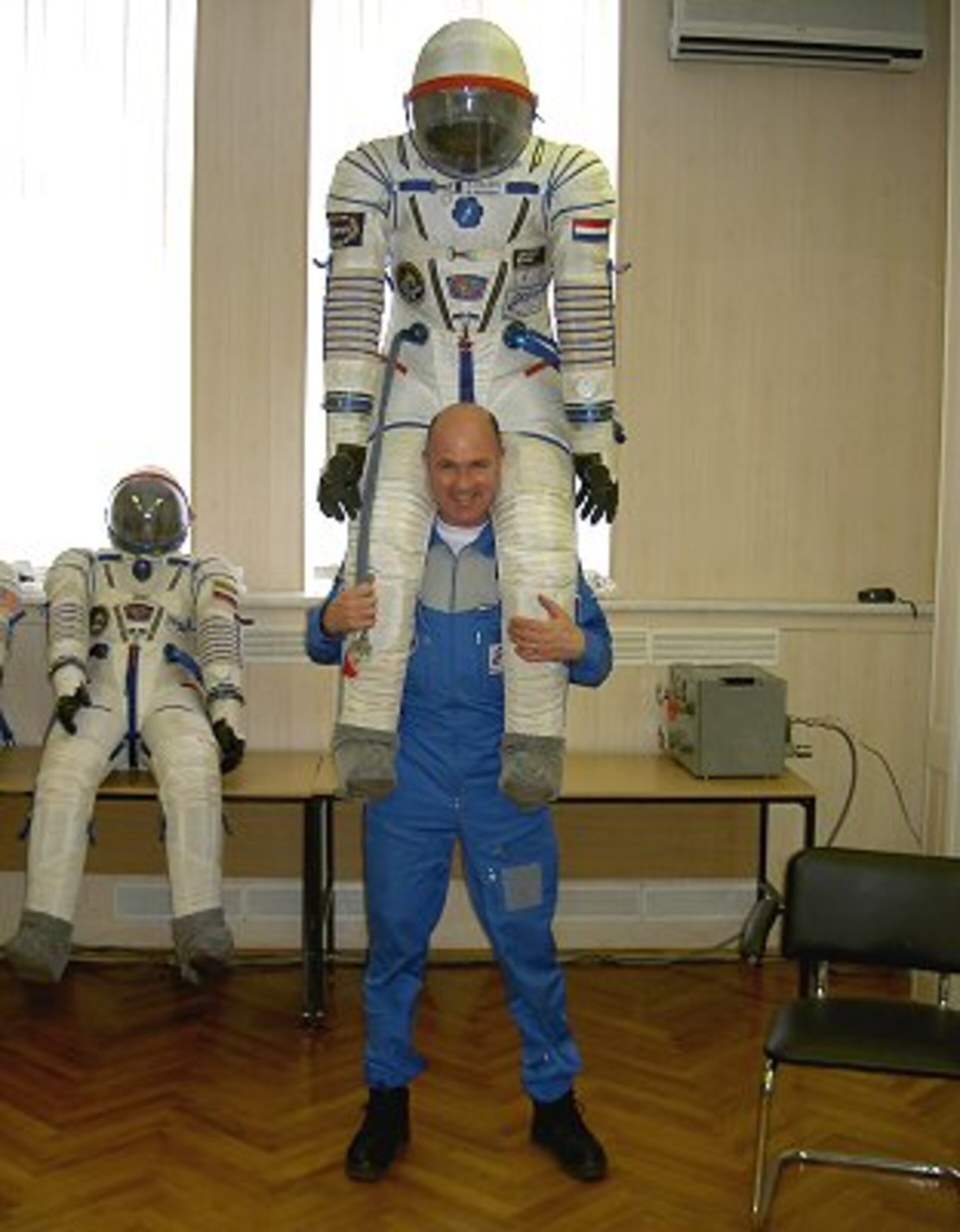 With spacesuit