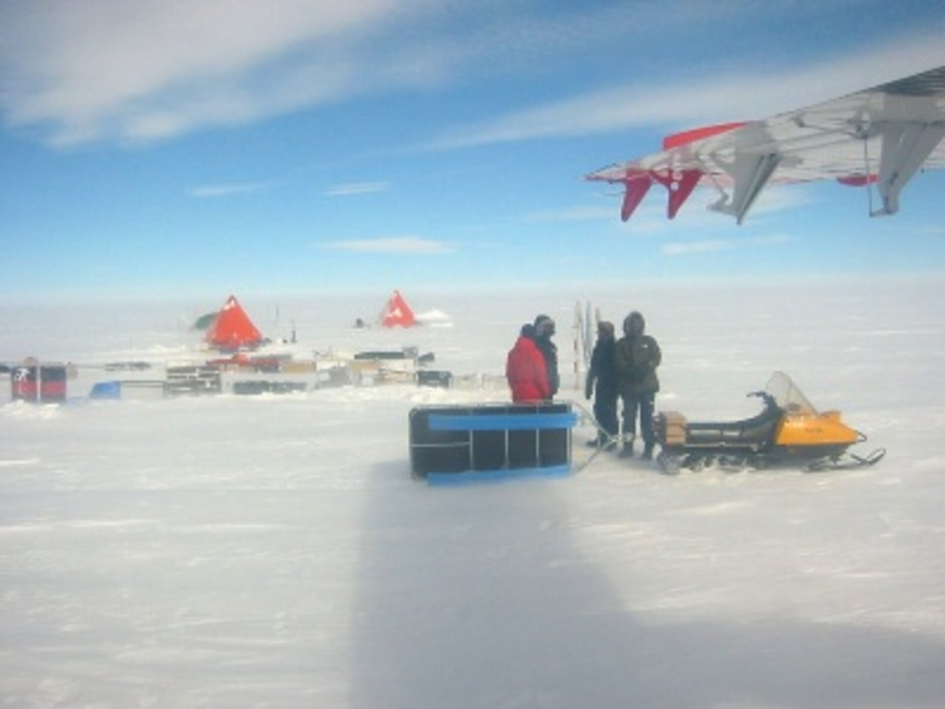 Researchers unloading equipment