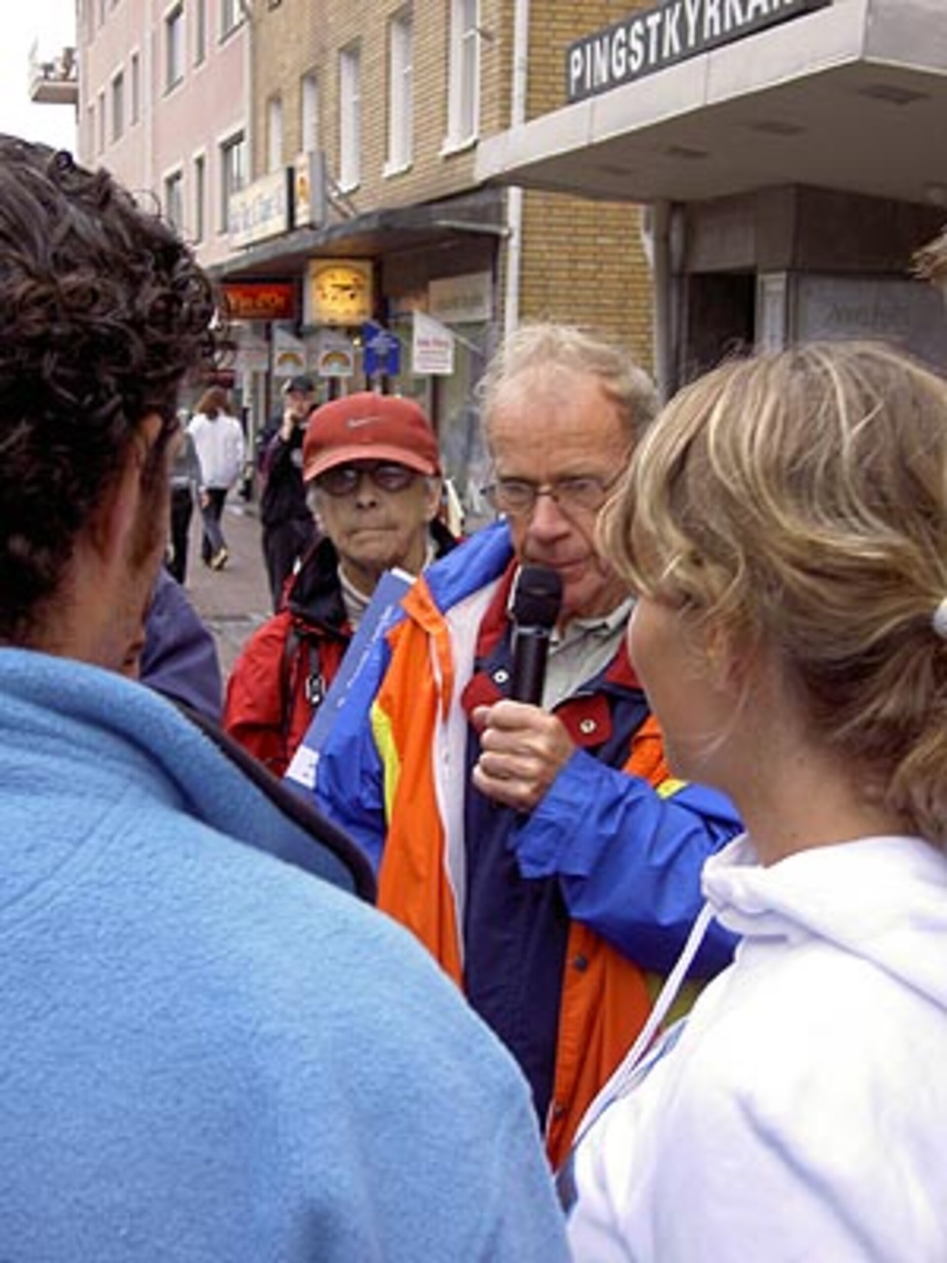 Team members interviewed by locals at Storgatan