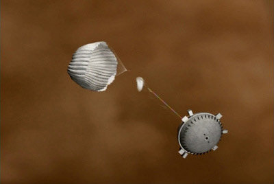 Huygens daalt met behulp van parachutes af naar het oppervlak van Titan