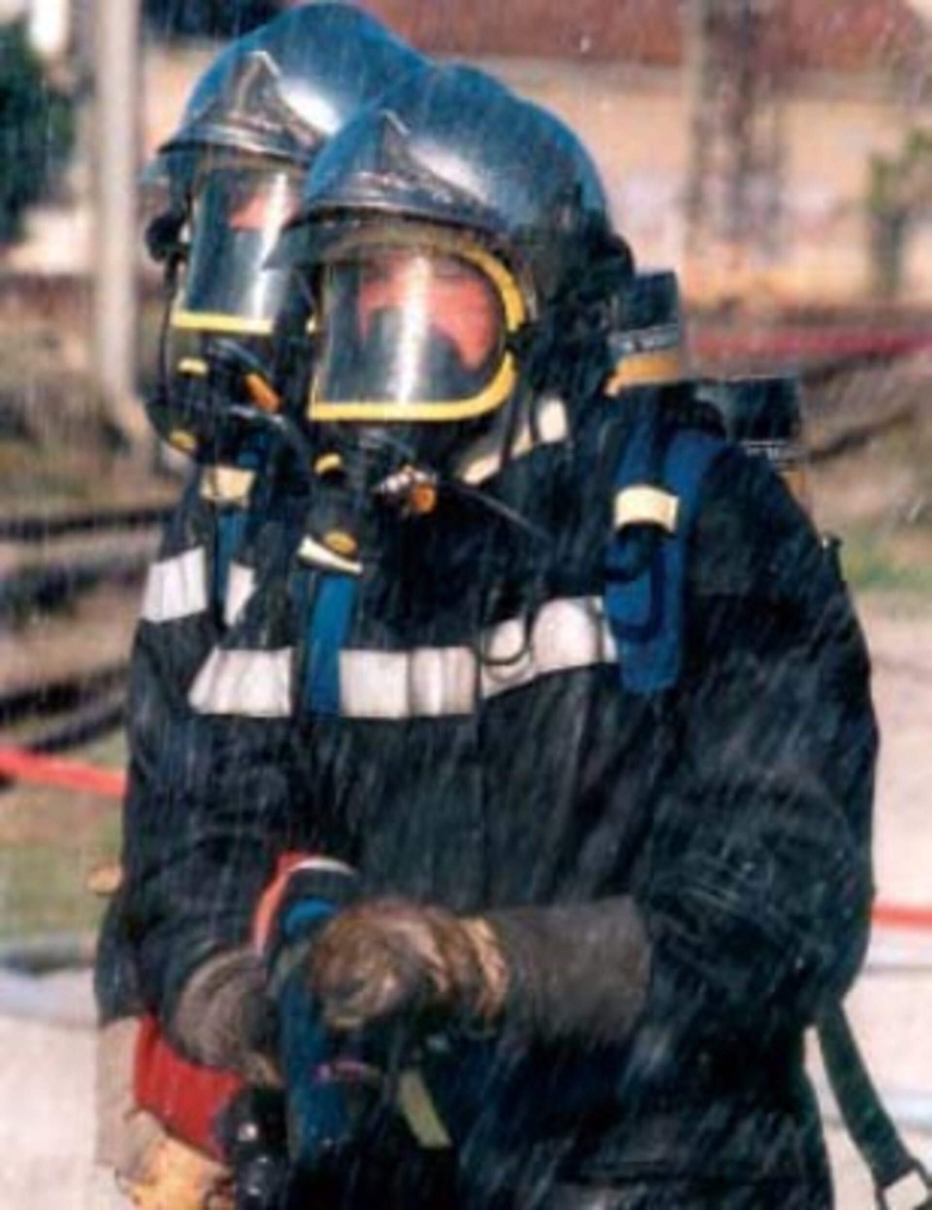 Firemen in protective gear