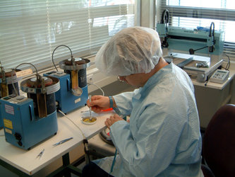 Danish student working on components for the on-board computer