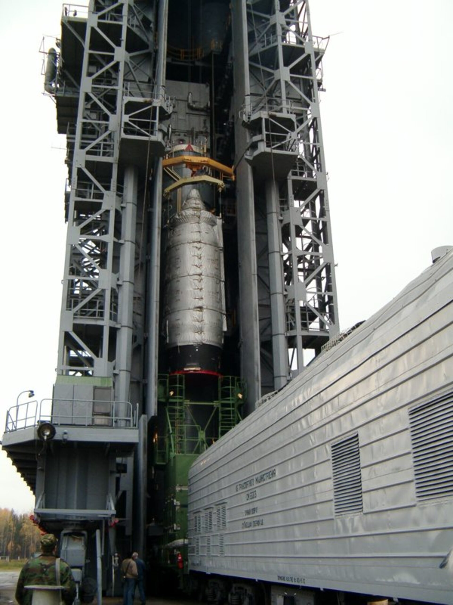 CryoSat's upper composite is lifted on top of the tower