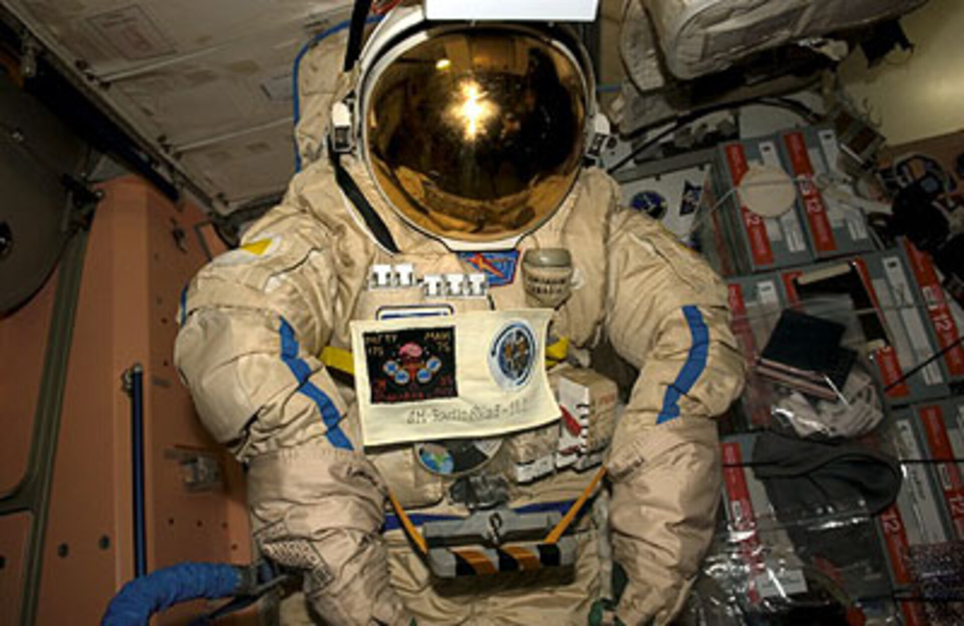 SuitSat in flight configuration. On the top of the helmet  is the electronics control panel along with the SuitSat antenna.