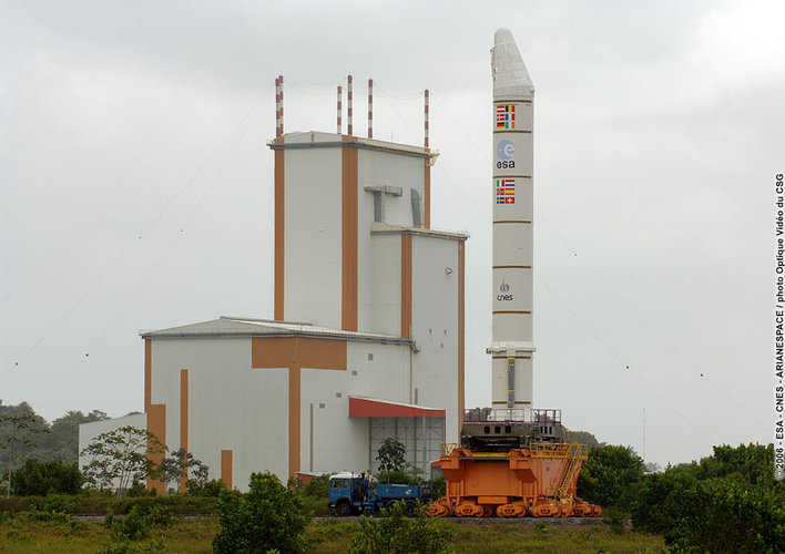 An Ariane 5 Solid Booster Stage, on a transporter, leaves the Booster Storage Building