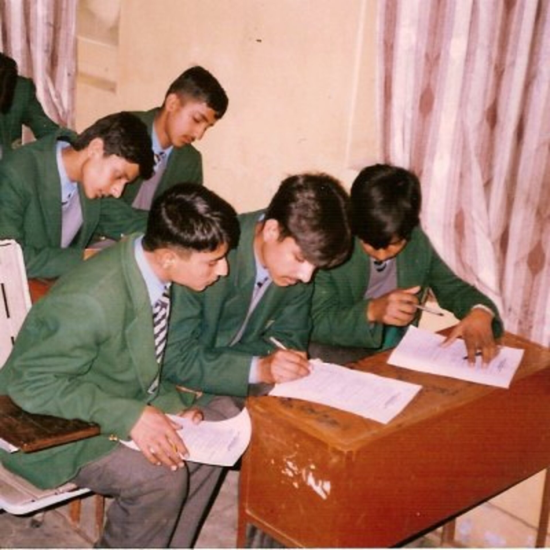 The students write their answer on a worksheet