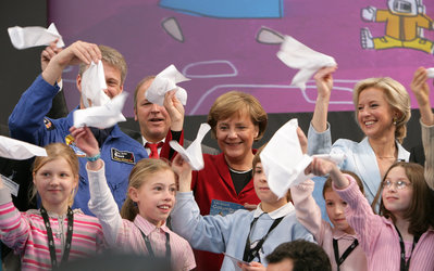Astronaut Thomas Reiter and German Chancellor Angela Merkel