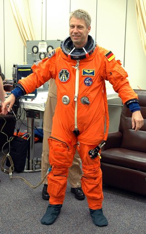 Thomas Reiter checks the fitting of his launch suit