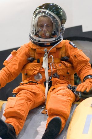Astronaut Christer Fuglesang using the crew escape slide