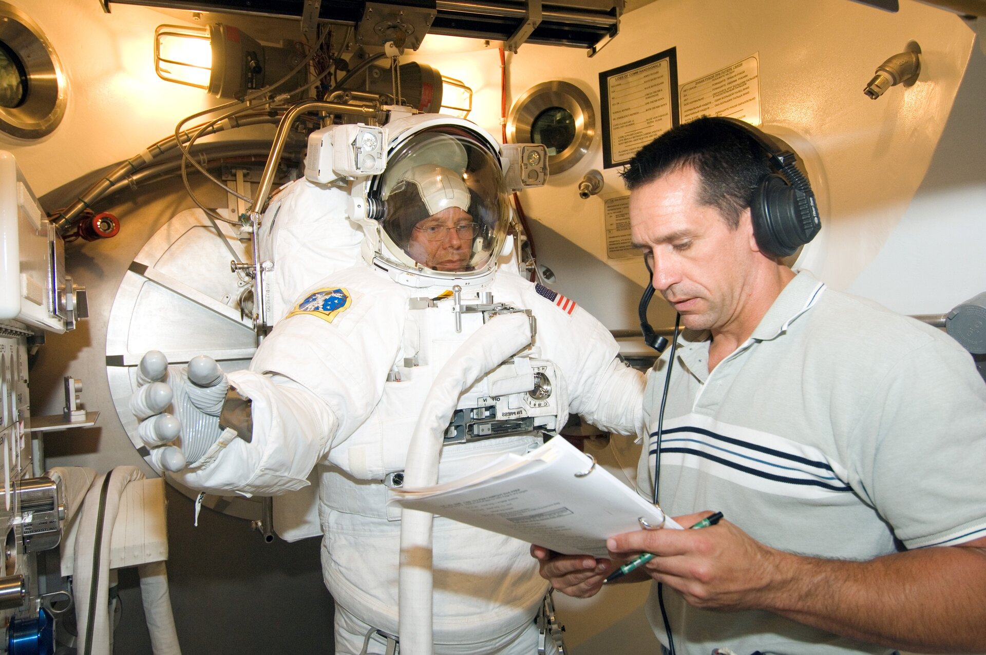 Fuglesang participates in EVA spacesuit fit check