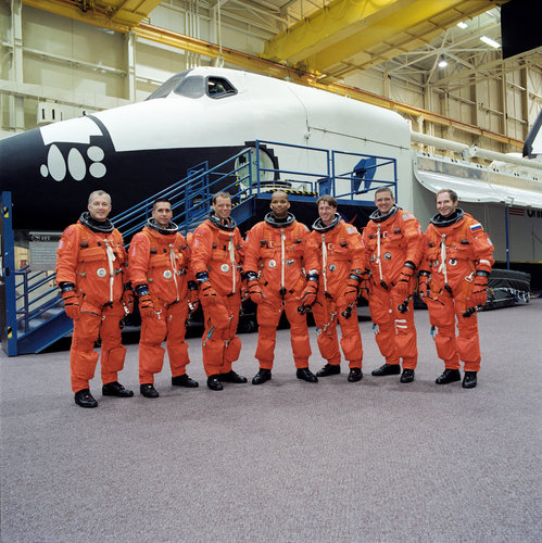 Members of STS-116 and Expedition 8 at NASA's Johnson Space Center