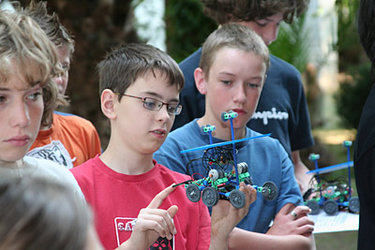 Children programming robots for Mars