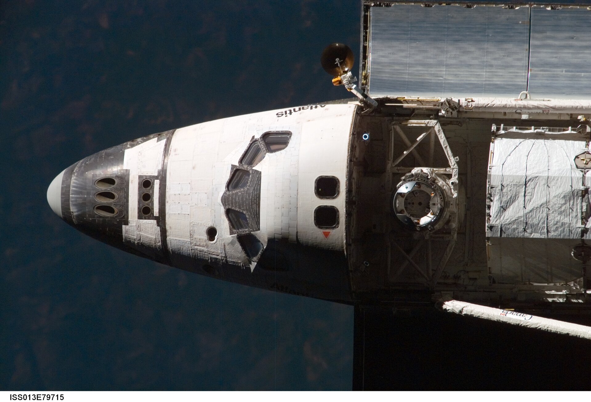Image of the Space Shuttle approaching the orbital outpost