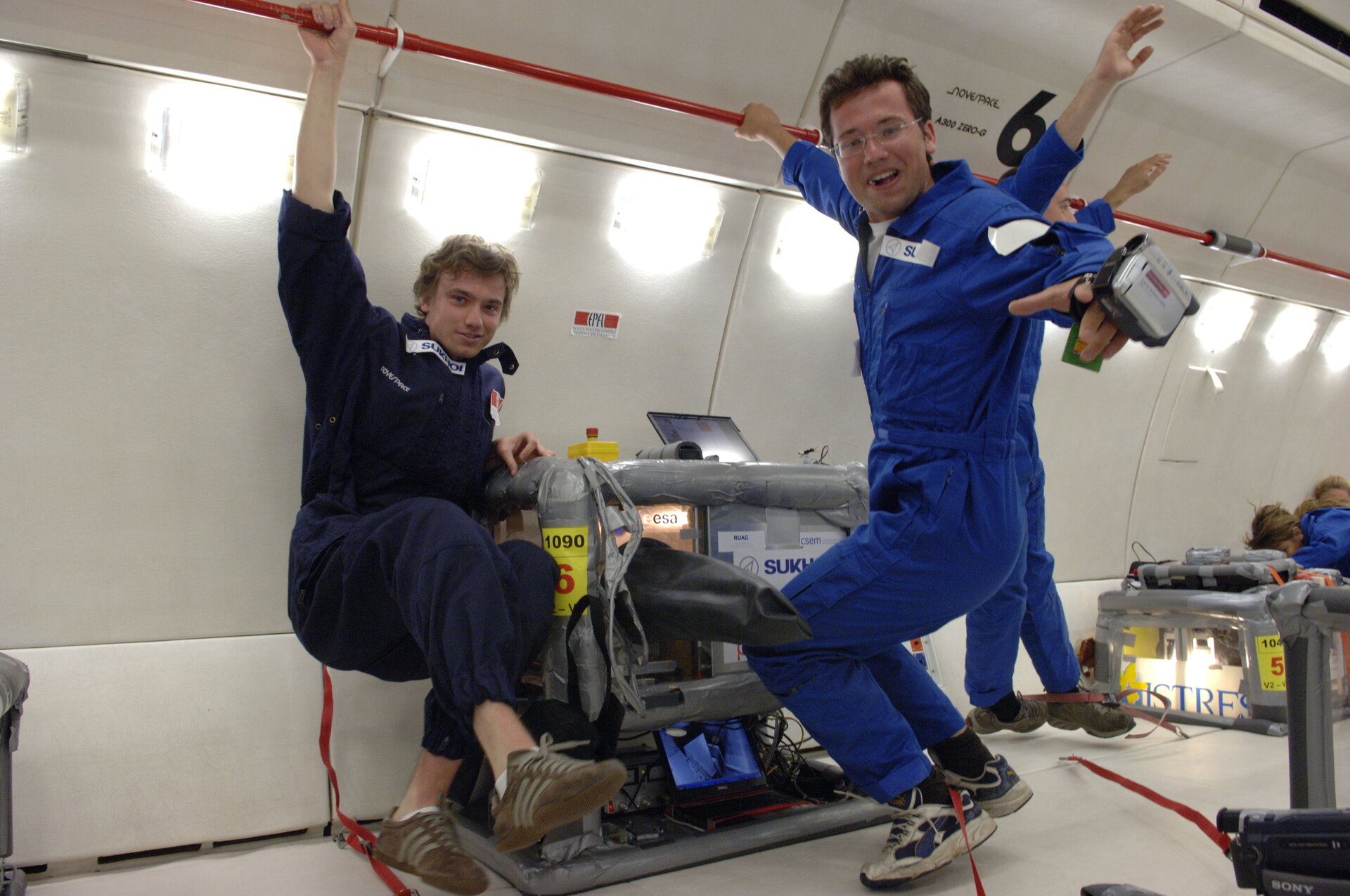 Two team members and their experiment in Zero-G