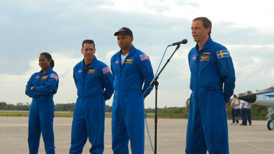 The crew answered questions from the media gathered at KSC