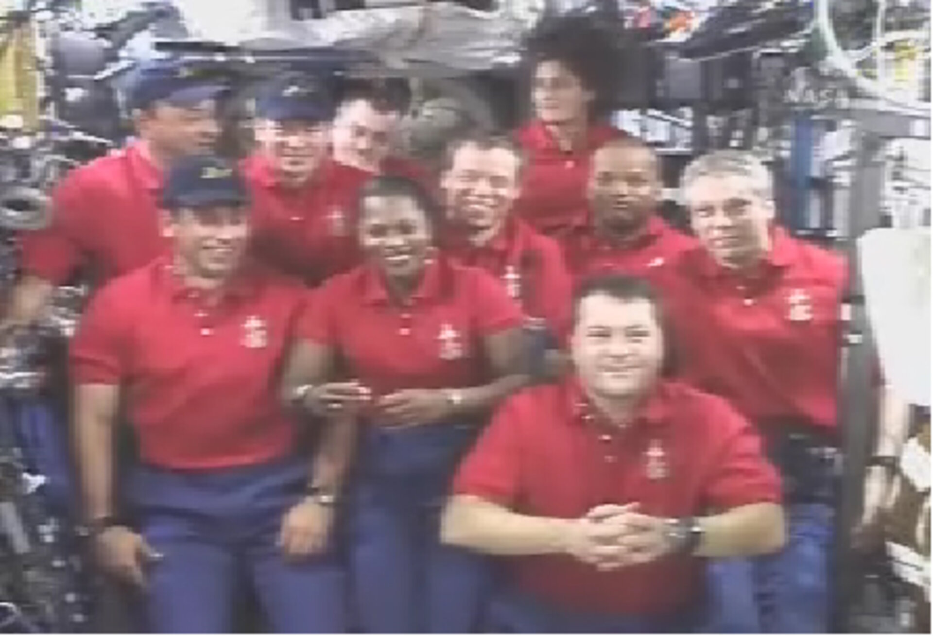 Shuttle and ISS crews take part in a joint news conference