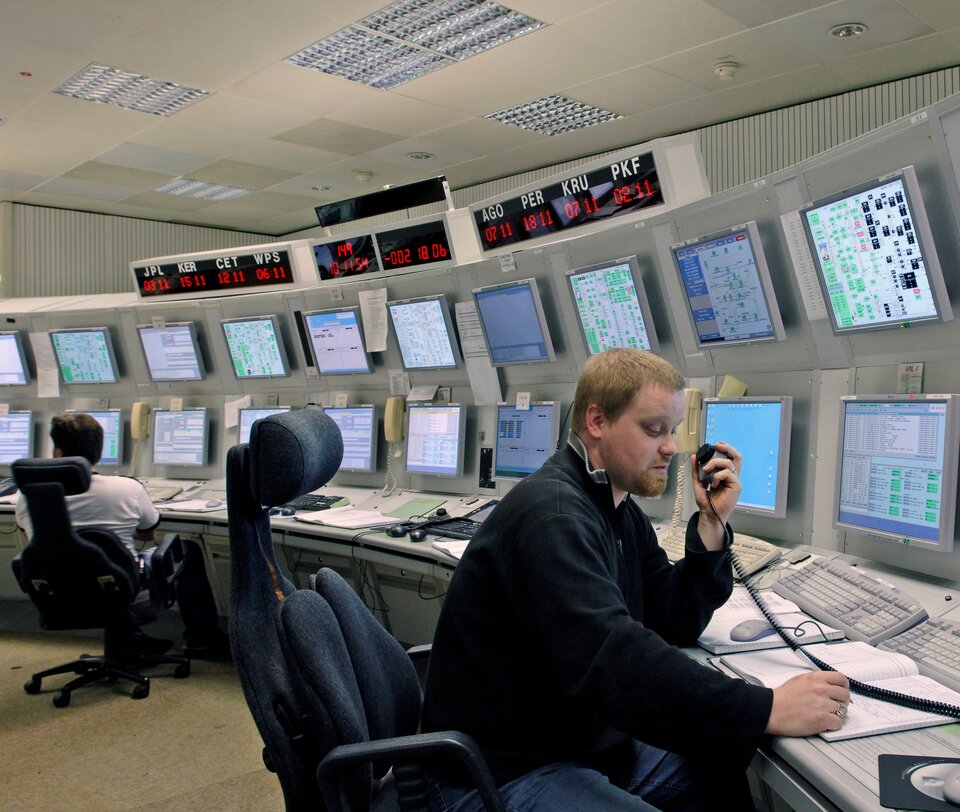 Station controller at work in ESOC's ESTRACK Control Centre