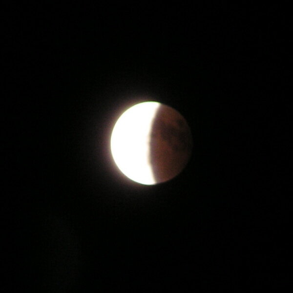 The moon leaving the Earth’s shadow again