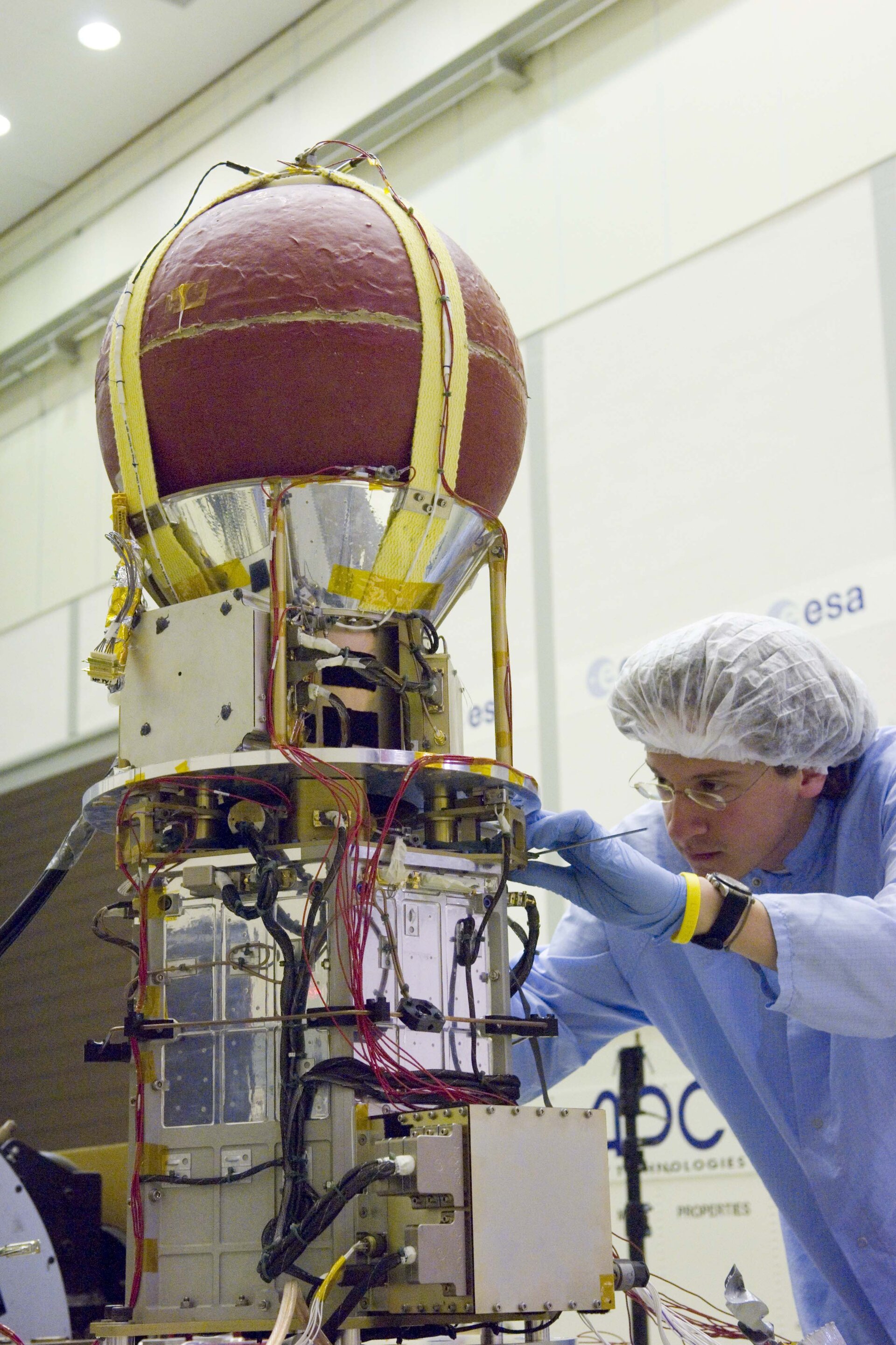 A student works on YES2 in the vibration facility at ESTEC