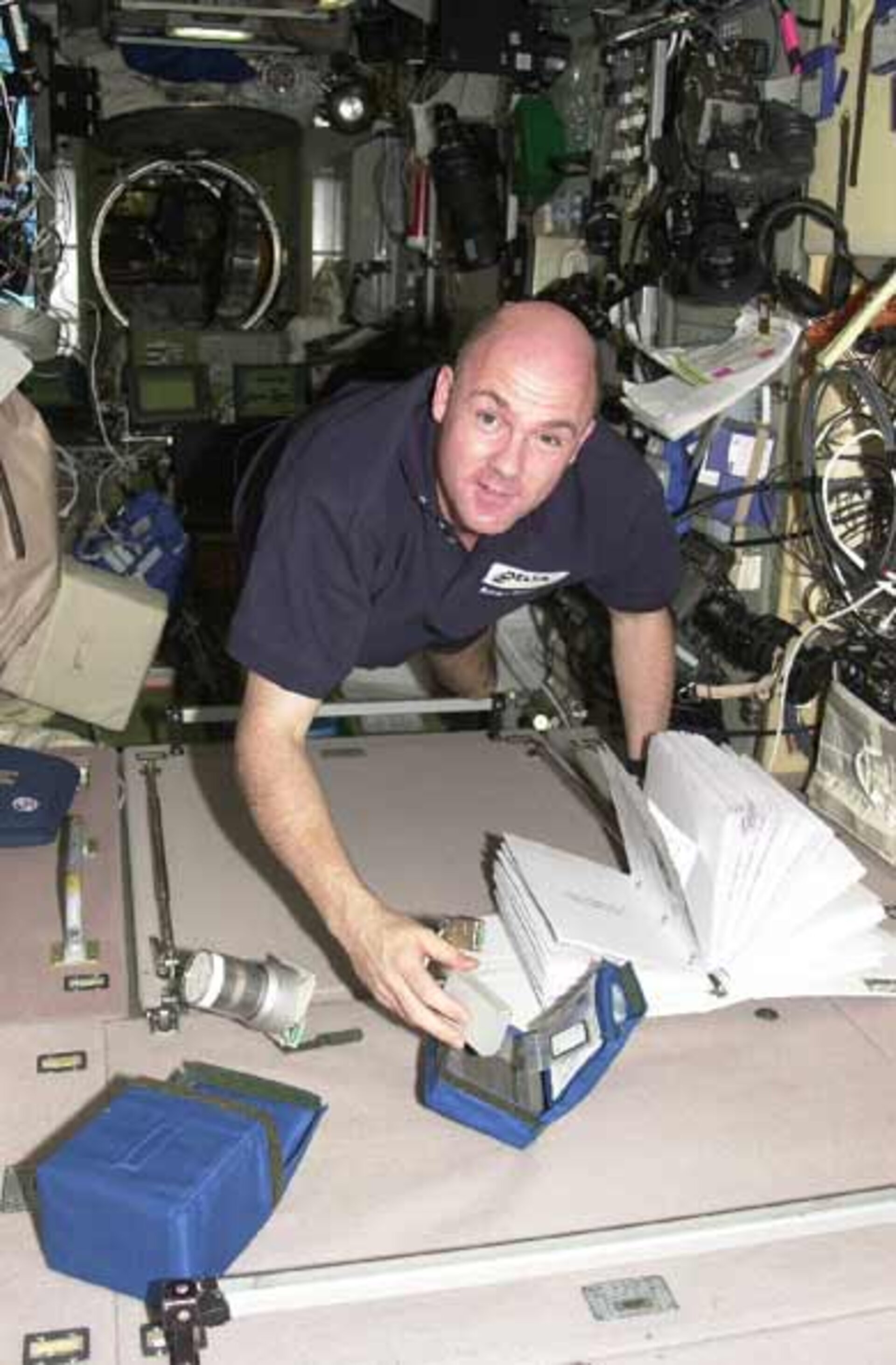 André Kuipers working on BugNRG on board the ISS