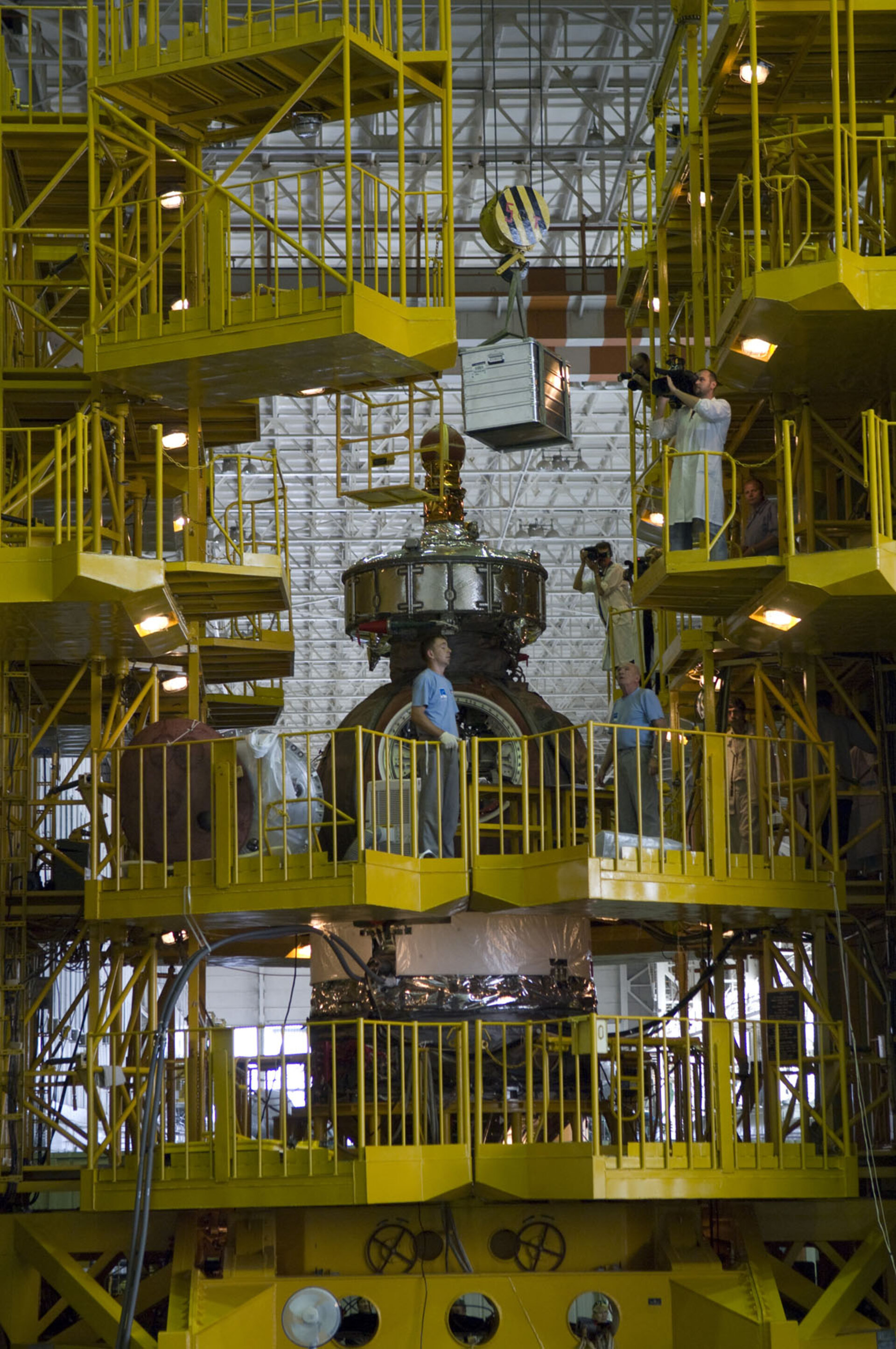 Preparation of the Foton-M3 spacecraft in the MIK Building at Baikonur Cosmodrome