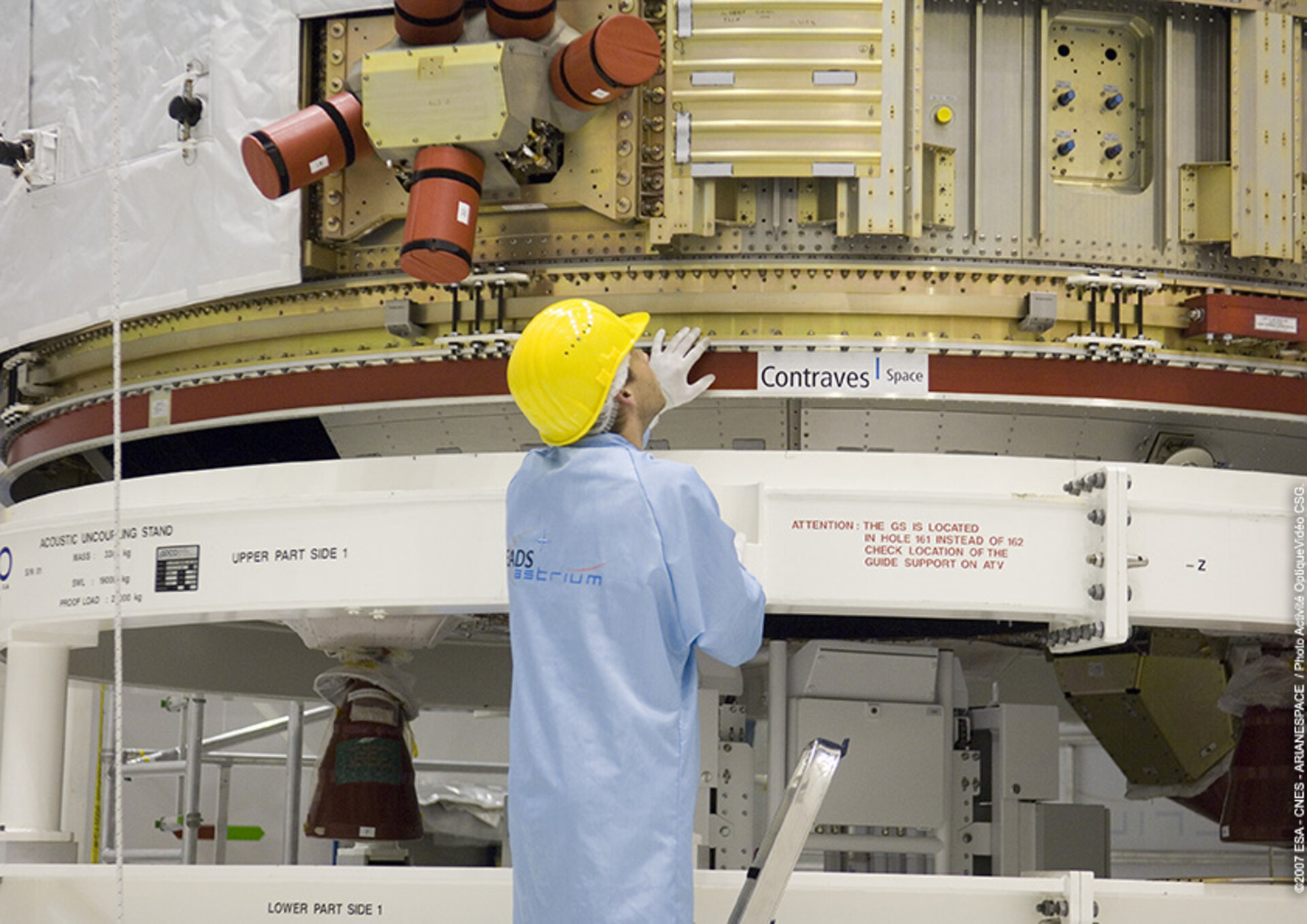 A section of Jules Verne ATV is rotated in order to attach the solar arrays to the spacecraft