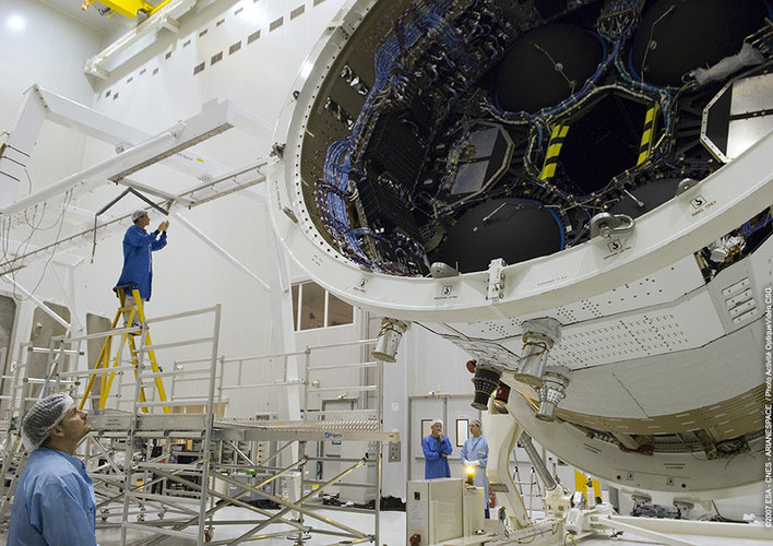 A section of Jules Verne ATV is rotated in order to attach the solar arrays to the spacecraft