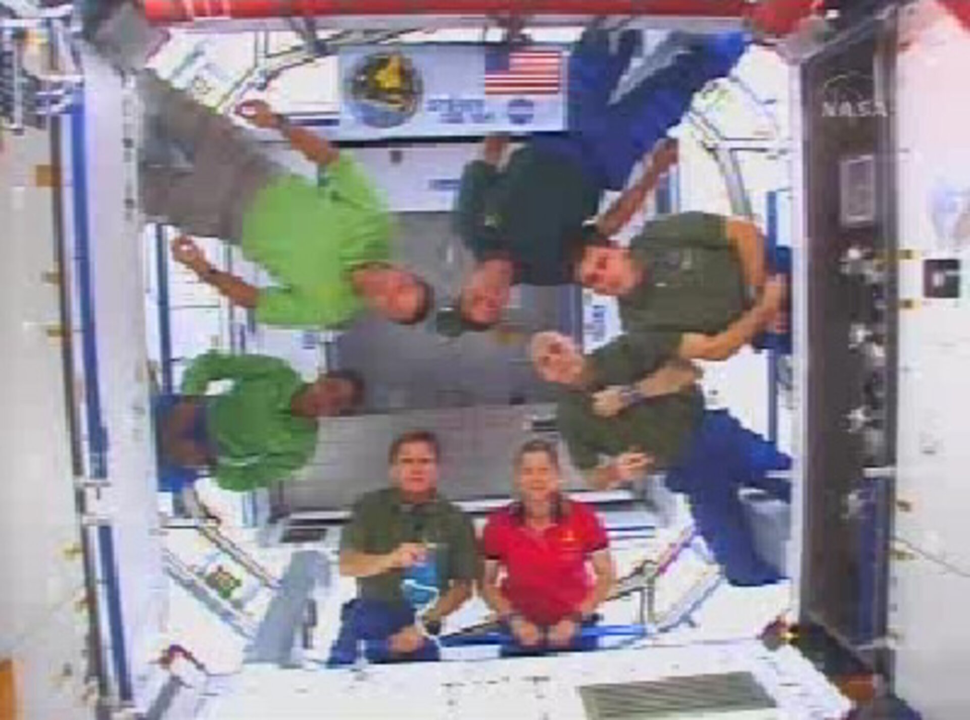 Members of the Shuttle and ISS crews participate in a join press event - the first to be hosted inside Harmony