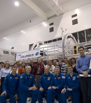 STS-122 astronauts and support team with the European Columbus laboratory