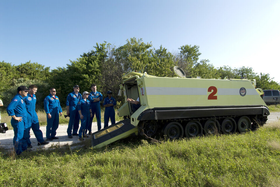 The STS-120 crew during training with the M-113 armoured personel carrier at KSC