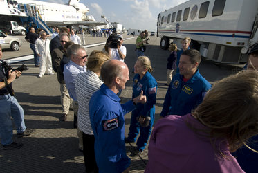 Gerhard Thiele congratulates members of the crew